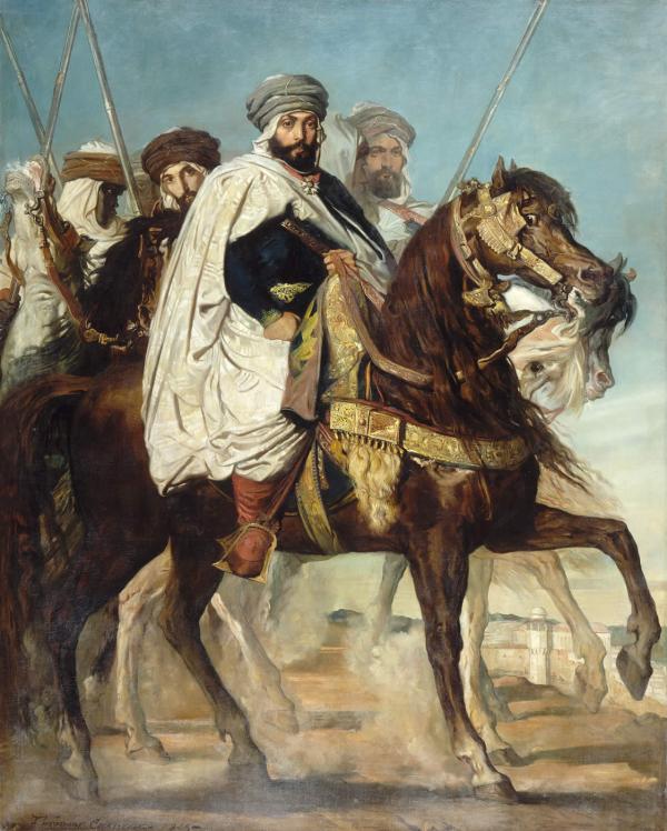 Ali Ben Ahmed, [...], suivi de son escorte en vue de la ville de Constantine.